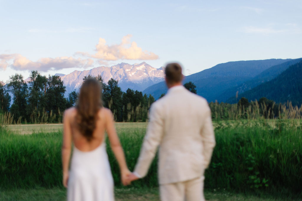 Romantic mountain wedding couple eloping in Banff National Park with turquoise lake backdrop — Unique Destination Wedding Canada Ideas.